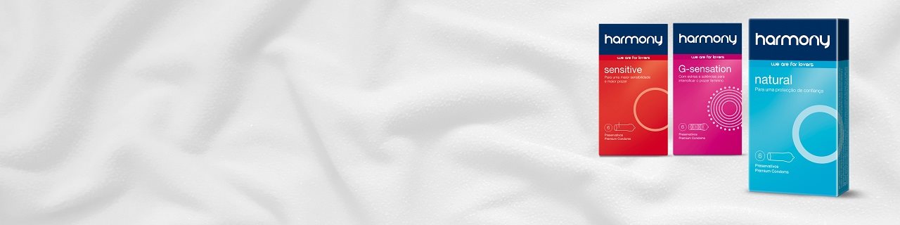 three harmony packages on a bed sheet